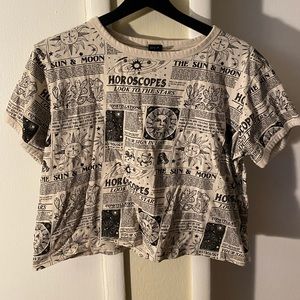 Astrology newspaper print shirt.
